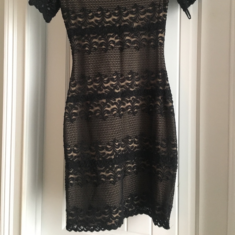 Black tight cocktail dress.